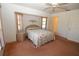 Cozy bedroom with double bed and adjacent bathroom access at 4330 Shappell St, Port Charlotte, FL 33948