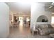 Open concept dining room with kitchen view and access to the backyard at 4330 Shappell St, Port Charlotte, FL 33948