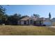 Single story house with a large yard and a two car garage at 4330 Shappell St, Port Charlotte, FL 33948