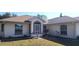 Single story house with attached garage and well maintained landscaping at 4330 Shappell St, Port Charlotte, FL 33948