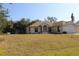 Single-story home with front yard and attached garage at 4330 Shappell St, Port Charlotte, FL 33948