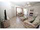 Spacious living room featuring tiled floors and ample natural light at 4330 Shappell St, Port Charlotte, FL 33948
