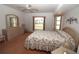 Main bedroom with ample natural light and a ceiling fan at 4330 Shappell St, Port Charlotte, FL 33948