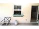 Small outdoor kitchen with pass-through window at 4330 Shappell St, Port Charlotte, FL 33948