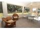 Relaxing screened porch with wicker furniture and view of backyard at 4330 Shappell St, Port Charlotte, FL 33948