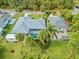 Aerial view showcasing a home with a pool and detached garage at 472 Eppinger Dr, Port Charlotte, FL 33953