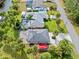 Aerial view of canal-side home, featuring a pool and detached structure at 472 Eppinger Dr, Port Charlotte, FL 33953