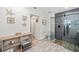 Modern bathroom with walk-in shower and gray tile at 472 Eppinger Dr, Port Charlotte, FL 33953