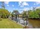 Private dock with gazebo, offering peaceful waterfront views at 472 Eppinger Dr, Port Charlotte, FL 33953