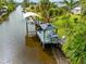 Private dock with gazebo and covered boat lift on canal at 472 Eppinger Dr, Port Charlotte, FL 33953