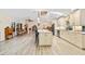Open kitchen with large island, granite countertops, and light-colored cabinets at 472 Eppinger Dr, Port Charlotte, FL 33953