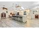 Spacious kitchen with an island, granite countertops, and stainless steel appliances at 472 Eppinger Dr, Port Charlotte, FL 33953