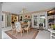 Indoor pool area with dining set and view of pool at 472 Eppinger Dr, Port Charlotte, FL 33953