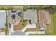 Aerial view of a single Gathering home and surrounding houses at 5608 New Covington Dr, Sarasota, FL 34233