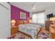 Spacious bedroom with wood flooring and a ceiling fan at 5608 New Covington Dr, Sarasota, FL 34233