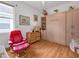 Guest bedroom with a wall bed and comfortable seating at 5608 New Covington Dr, Sarasota, FL 34233