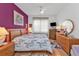 Large bedroom with wood flooring and plenty of natural light at 5608 New Covington Dr, Sarasota, FL 34233