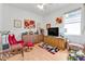 Cozy den with comfortable seating and built in shelving at 5608 New Covington Dr, Sarasota, FL 34233