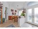 Charming dining area with a round table and modern chandelier at 5608 New Covington Dr, Sarasota, FL 34233