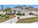 Single Gathering home exterior with driveway and landscaping at 5608 New Covington Dr, Sarasota, FL 34233