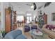 Open living room featuring comfortable seating and wood flooring at 5608 New Covington Dr, Sarasota, FL 34233