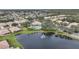 Community view with lake, fountain and homes at 6049 Grand Cypress Blvd, North Port, FL 34287