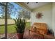 Relaxing screened patio with seating and outdoor views at 6049 Grand Cypress Blvd, North Port, FL 34287