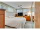 Bright bedroom with a double bed, dresser, and ceiling fan at 6305 Parkview Ct, North Port, FL 34287
