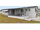 Front view of mobile home with covered porch at 6305 Parkview Ct, North Port, FL 34287