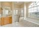 Bathroom with walk-in shower, soaking tub, and updated vanity at 632 Balsam Apple Dr, Venice, FL 34293