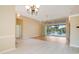 Dining room with view of the pool and sliding doors at 632 Balsam Apple Dr, Venice, FL 34293