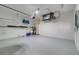 Bright garage with ample storage shelving at 632 Balsam Apple Dr, Venice, FL 34293