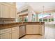 Kitchen with granite countertops, stainless steel appliances, and breakfast bar at 632 Balsam Apple Dr, Venice, FL 34293