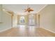 Open living area with hardwood floors and high ceilings at 632 Balsam Apple Dr, Venice, FL 34293