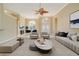 Spacious living room with light flooring and neutral decor at 632 Balsam Apple Dr, Venice, FL 34293