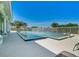 Community pool with a spa and a relaxing patio area at 632 Balsam Apple Dr, Venice, FL 34293
