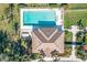 Community pool and adjacent building from above at 632 Balsam Apple Dr, Venice, FL 34293