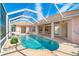 Inviting kidney-shaped pool with screened enclosure at 632 Balsam Apple Dr, Venice, FL 34293