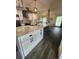 Spacious kitchen with expansive island and white cabinetry at 258 Beeney Se Rd, Port Charlotte, FL 33952