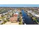 Property's location on canal with boat access, near other homes at 1002 Messina Dr, Punta Gorda, FL 33950