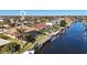 Waterfront home with private dock and lush landscaping at 1002 Messina Dr, Punta Gorda, FL 33950