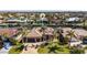 Aerial view of waterfront home with private dock and pool at 1002 Messina Dr, Punta Gorda, FL 33950