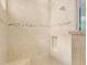 Large walk-in shower with built-in seat at 1002 Messina Dr, Punta Gorda, FL 33950