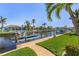 Private dock with boat lift and canal access at 1002 Messina Dr, Punta Gorda, FL 33950