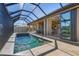 Luxury pool and spa with covered lanai at 1002 Messina Dr, Punta Gorda, FL 33950