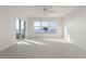 Bedroom with ocean view and sliding glass doors at 101 N Marion Ct # 221, Punta Gorda, FL 33950