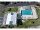 Aerial view of community pool and clubhouse at 101 N Marion Ct # 221, Punta Gorda, FL 33950