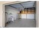 Garage with storage loft and shelving at 101 N Marion Ct # 221, Punta Gorda, FL 33950