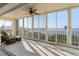 Spacious waterfront lanai with sliding glass doors and seating at 101 N Marion Ct # 221, Punta Gorda, FL 33950