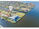 Aerial view showcasing waterfront home and community at 11 Sabal Dr, Punta Gorda, FL 33950